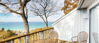 Updated condo in Glen Arbor with Lake Michigan views, fireplace, deck, W/D