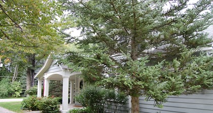 Charming home near Glen Arbor with a porch, gas grill, lake views, & AC