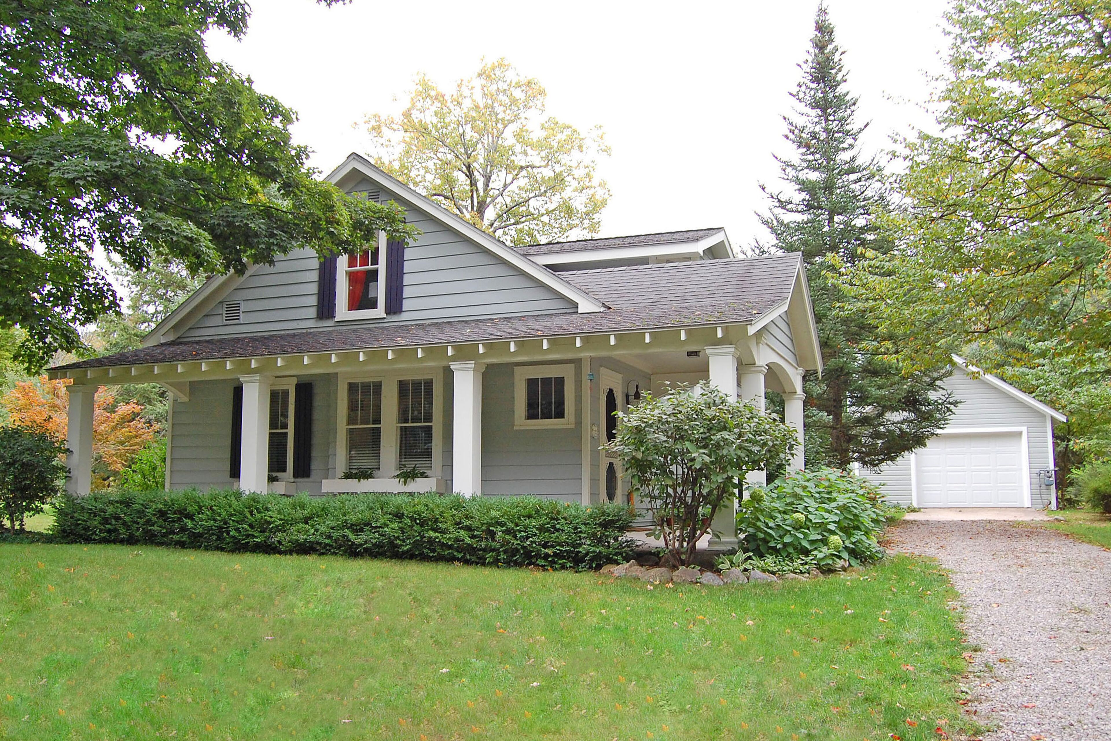 Charming home near Glen Arbor with a porch, gas grill, lake views, & AC