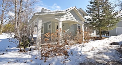 Charming home near Glen Arbor with a porch, gas grill, lake views, & AC