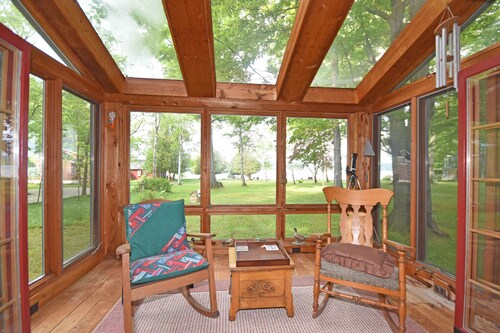 Lakefront home on Little Glen Lake with fireplace, deck, gas grill, and firepit