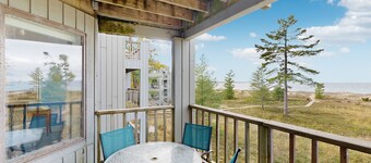 Cheery beachfront condo in Glen Arbor's Homestead Resort with deck & fireplace