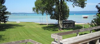 Lakefront cottage with a deck, grill, firepit, dock & partial AC