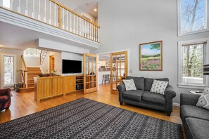 TV, fireplace, DVD player - Spacious home with studio, lake access, sunroom, fireplace, W/D, & central AC (Glen Arbor)