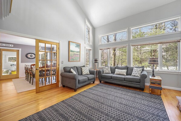 TV, fireplace, DVD player - Spacious home with studio, lake access, sunroom, fireplace, W/D, & central AC (Glen Arbor)