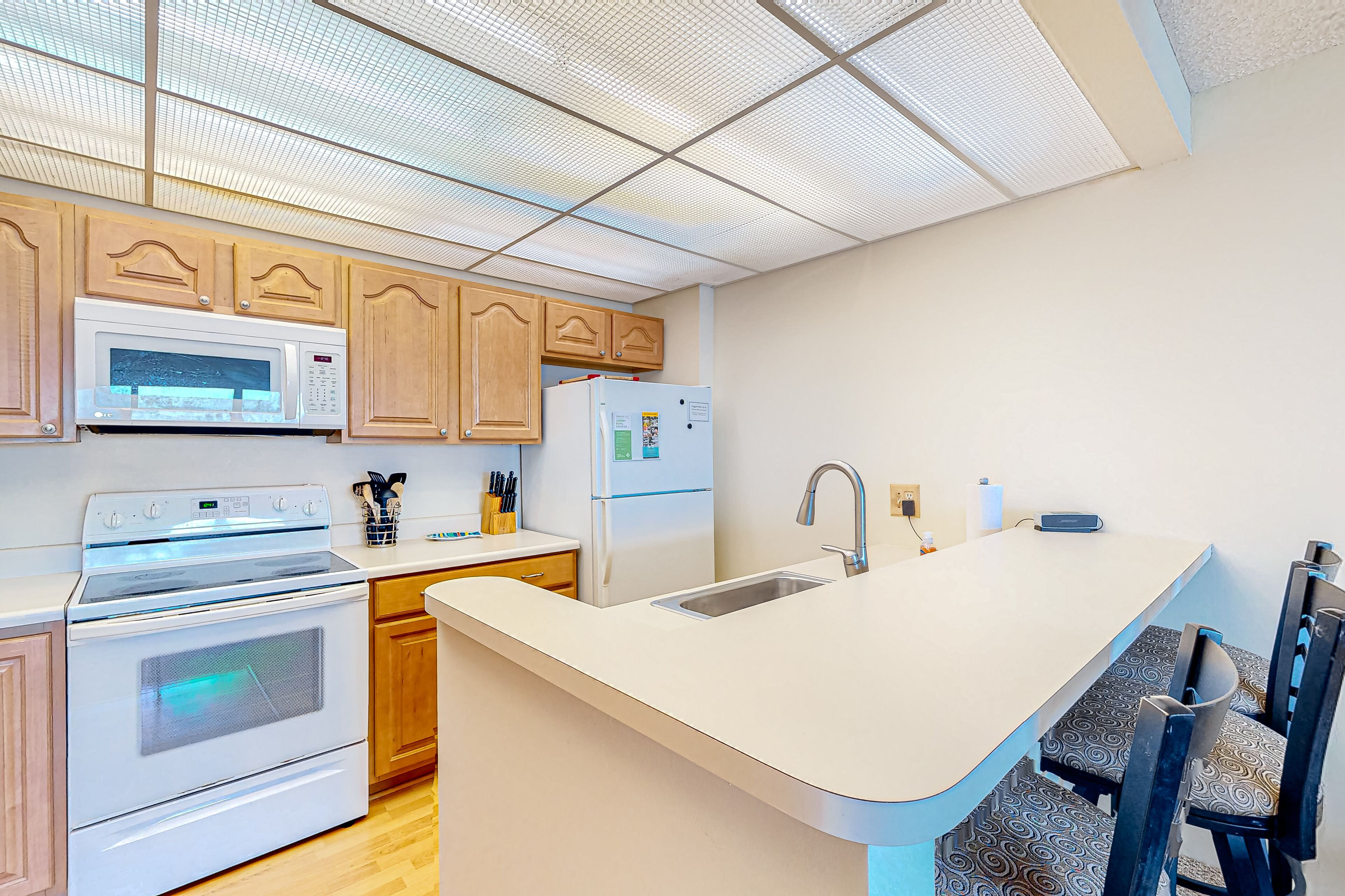 Charming and updated lake view condo with fireplace, pleasant balcony & W/D