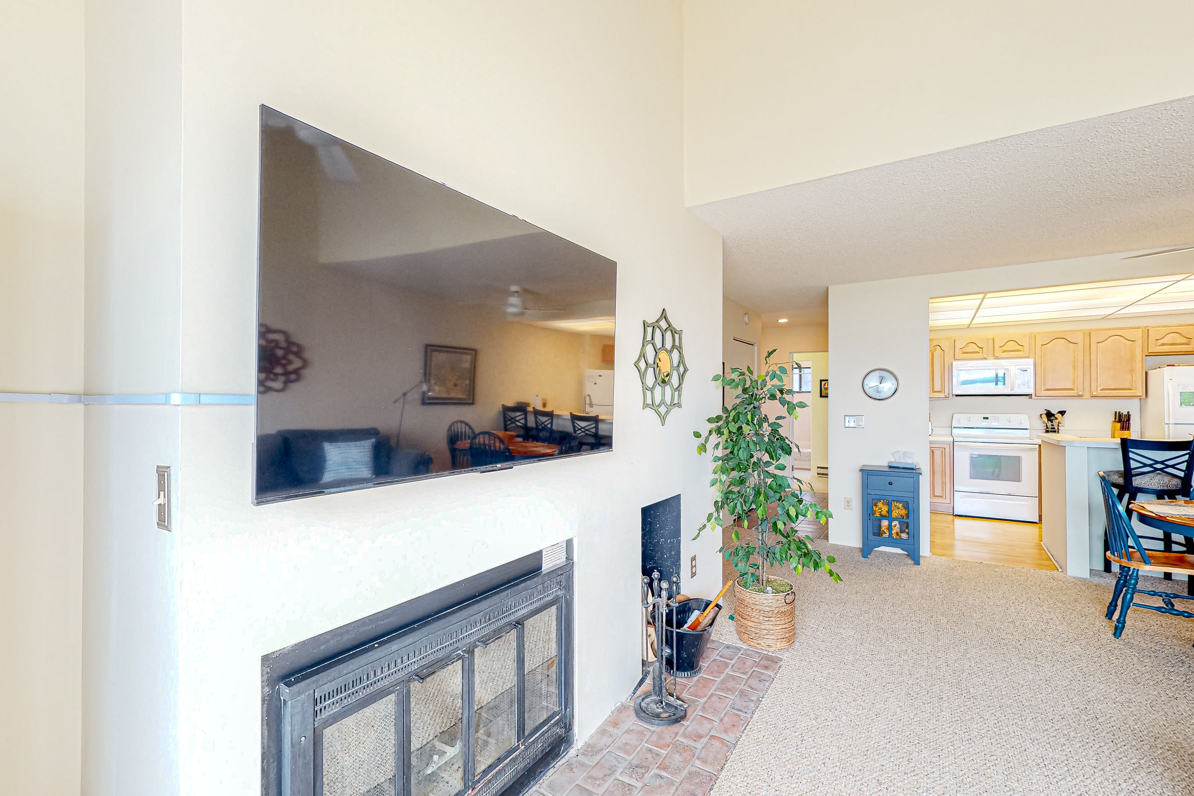 Charming and updated lake view condo with fireplace, pleasant balcony & W/D