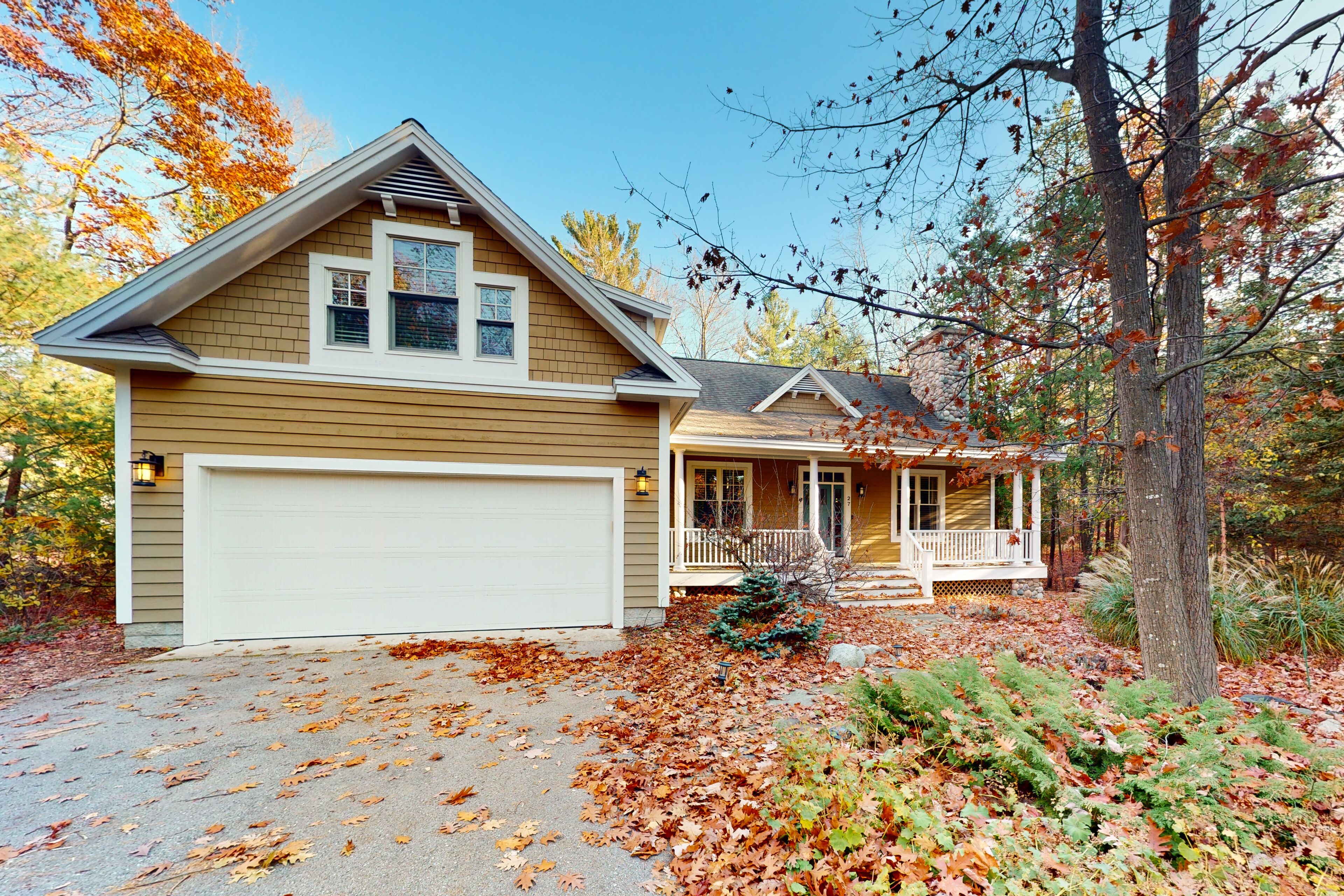Beautiful updated home in downtown Glen Arbor with front porch, fireplace, grill