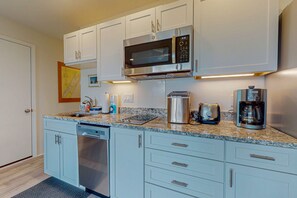 Microwave, coffee/tea maker, toaster, cookware/dishes/utensils