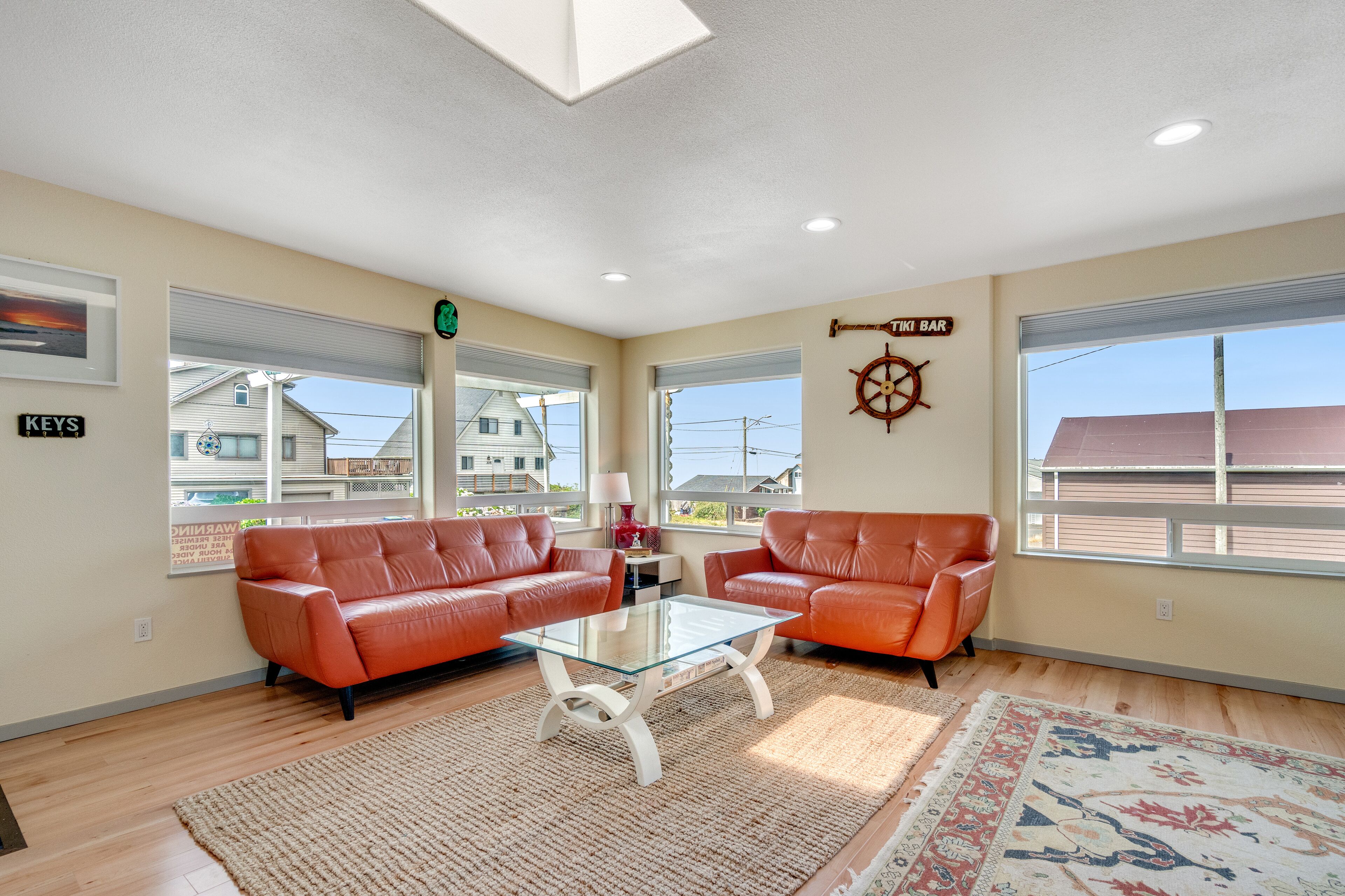 Light-filled home in the heart of town with deck & W/D - steps to beach access