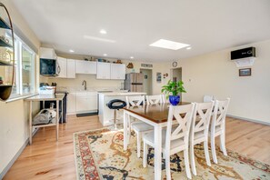 Fridge, microwave, oven, stovetop - Light-filled home in the heart of town with deck & W/D - steps to beach access (Lincoln City)