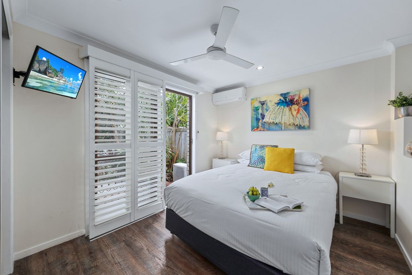 Relax after a day at the beach in the comfortable queen bed with quality linens which we supply for your convenience.