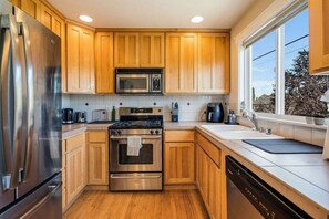 Fridge, microwave, oven, stovetop - Perch - Walk to Lake Union! Spacious 3BR/3.5BA w/ Garage (Seattle)