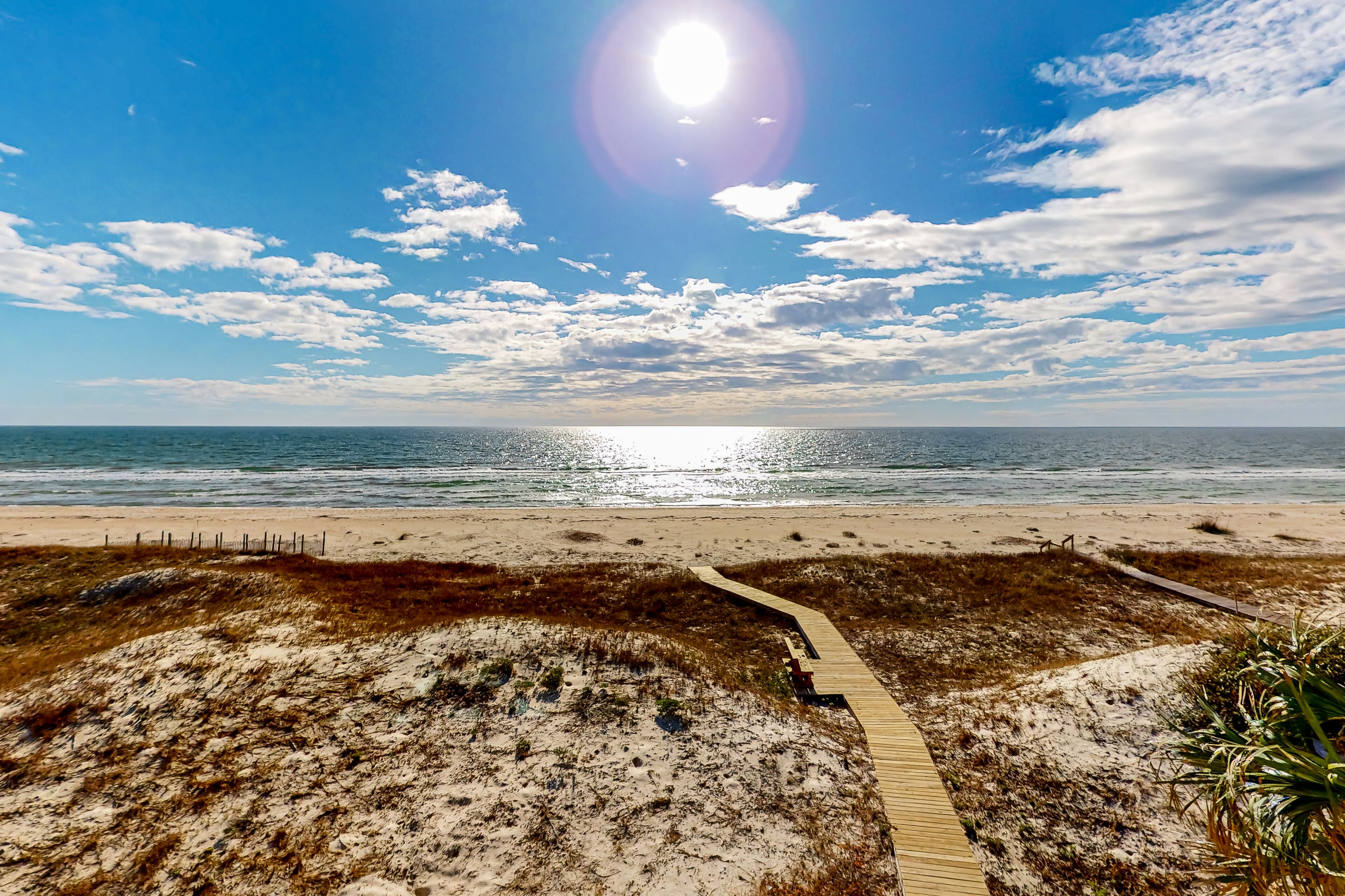 Dog-friendly beachfront home with private pool, on-site pool, gym, & central AC