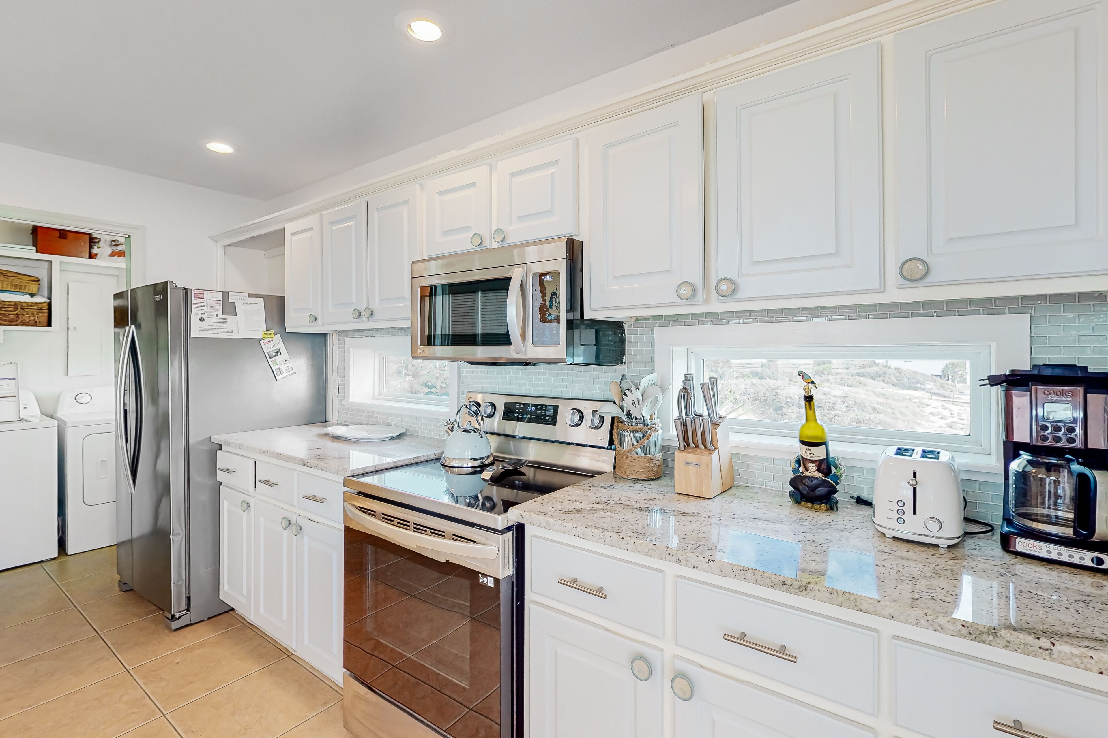 Dog-friendly beachfront home with private pool, on-site pool, gym, & central AC