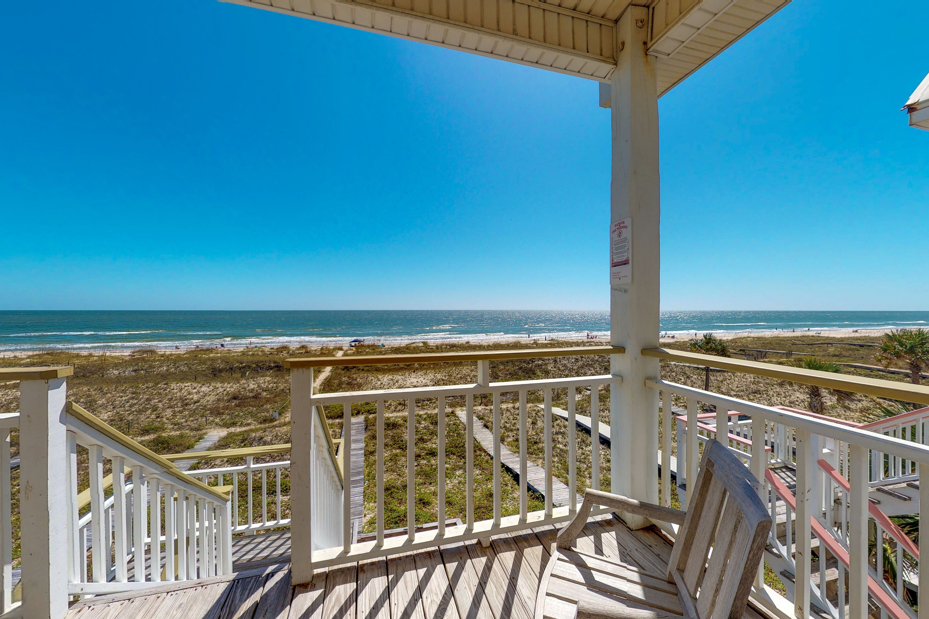 Dog-friendly beachfront bungalow with private boardwalk, gas grill, and AC