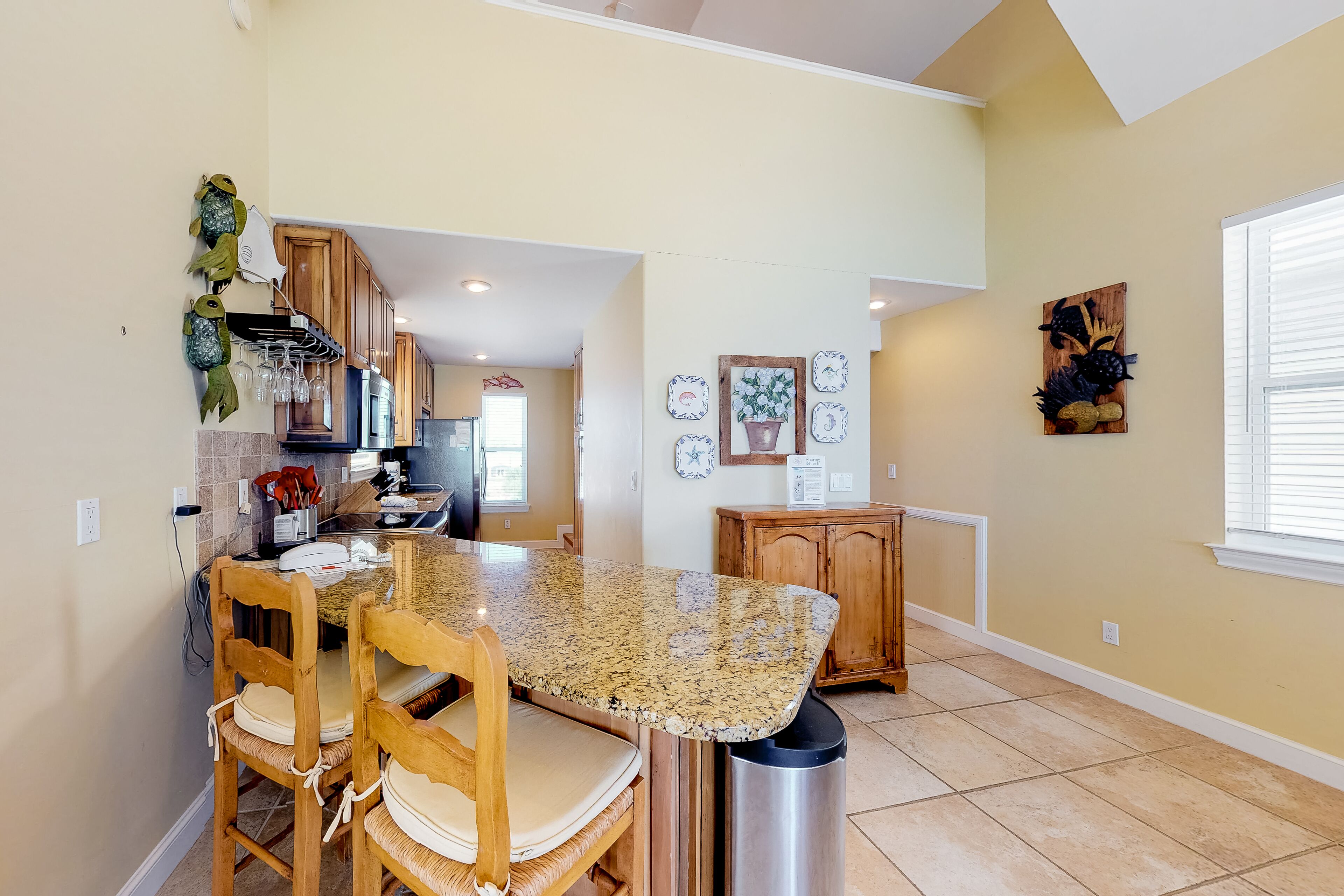 Dog-friendly beachfront bungalow with private boardwalk, gas grill, and AC