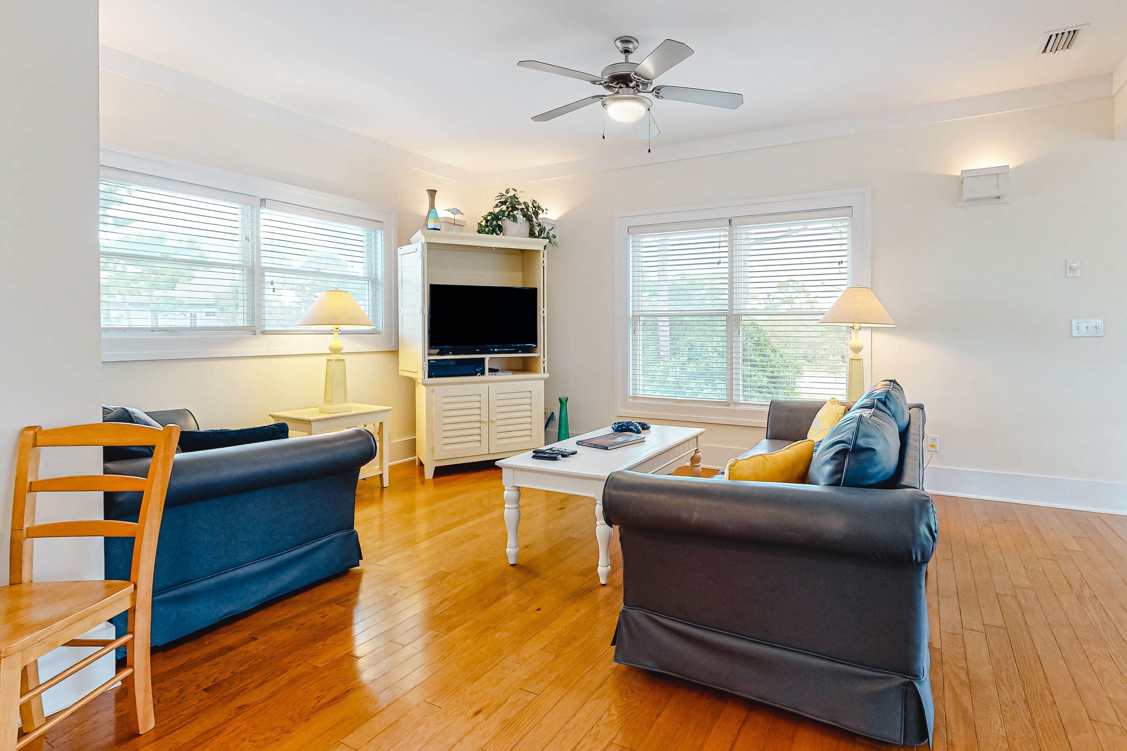 Spacious dog-friendly home with elevator, screened decks, on-site pool, & gym