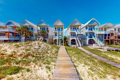 Dog-friendly beachfront home with private boardwalk, gas grill, deck, beach view