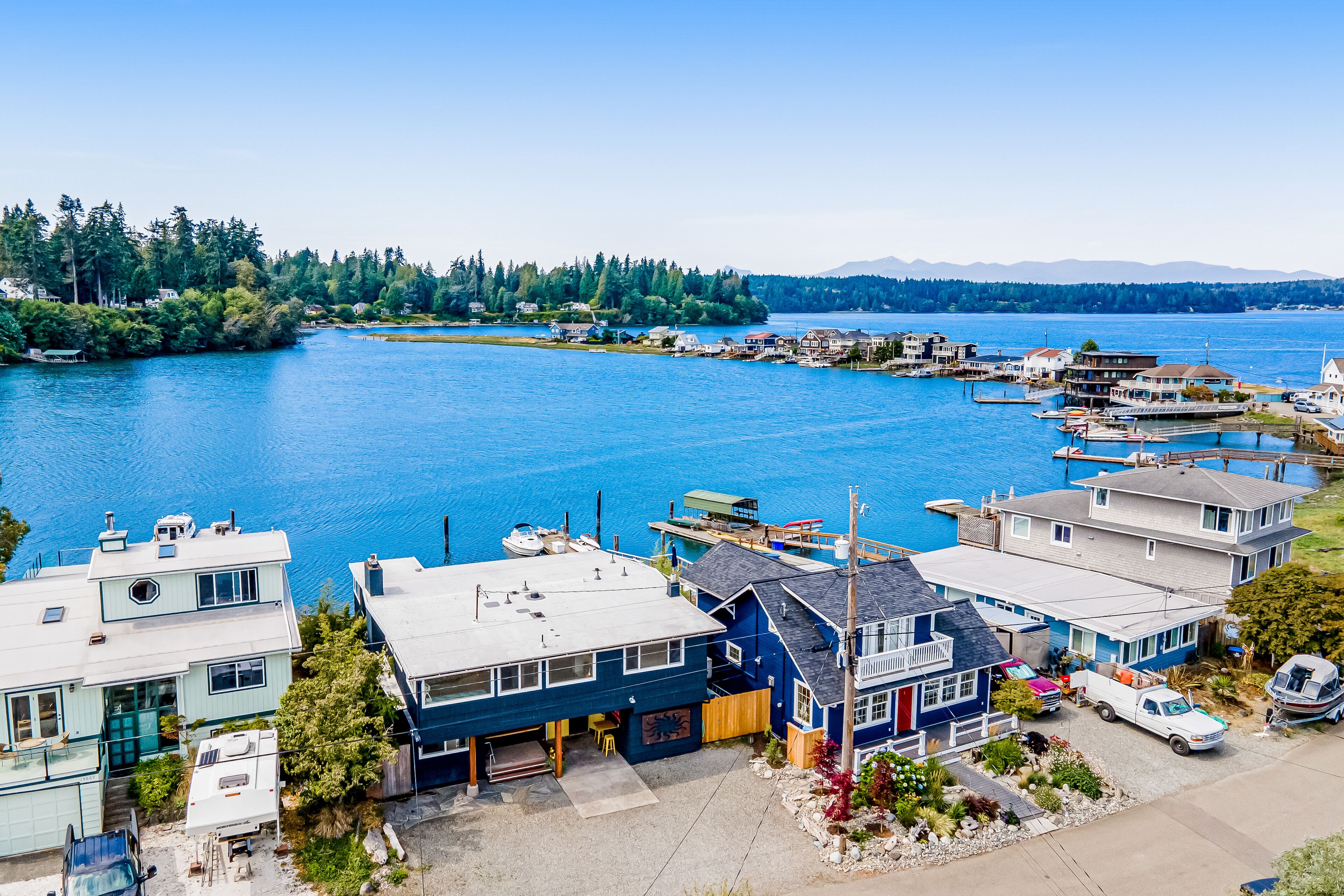 Waterfront home with 360º views, patio, firepit, deck, chef's kitchen, game room