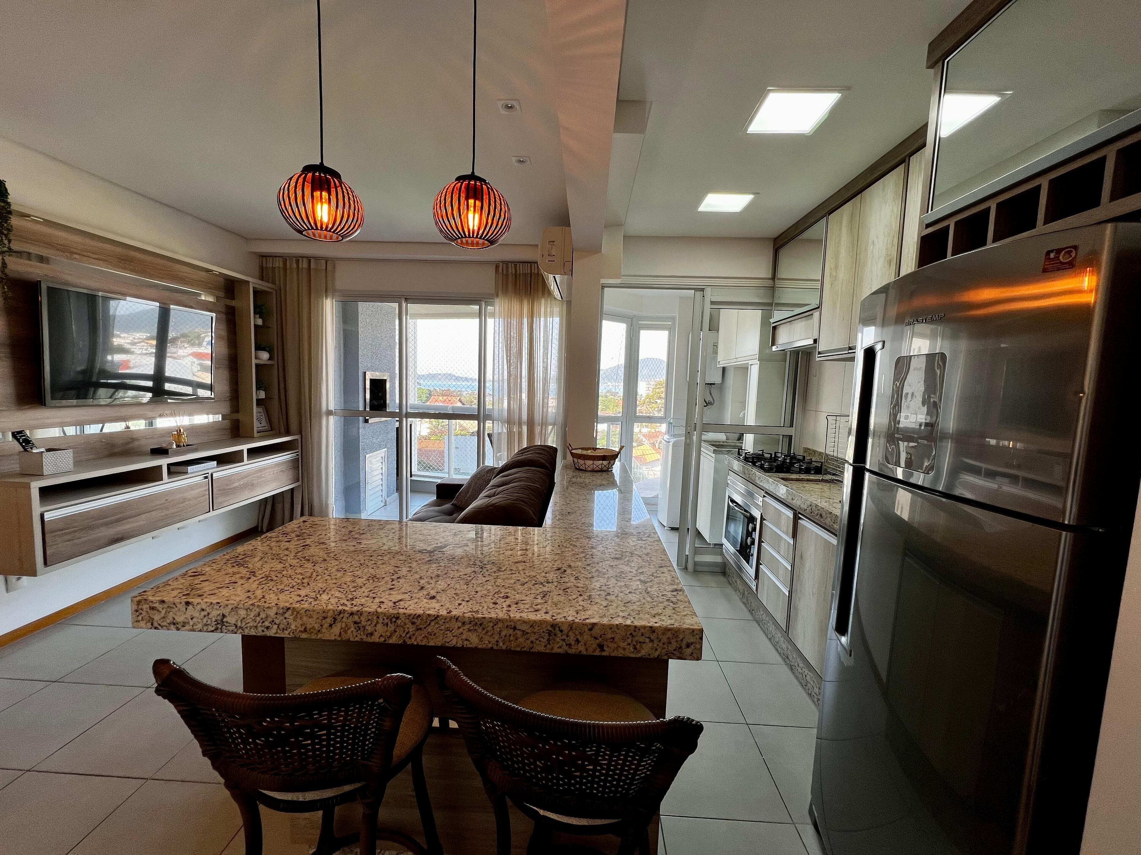 Grand Apartment, Pool Access, Sea View (Surfside Luxury - Nautilus Home Club) | Living room | 32-inch Smart TV with digital channels, TV, Netflix