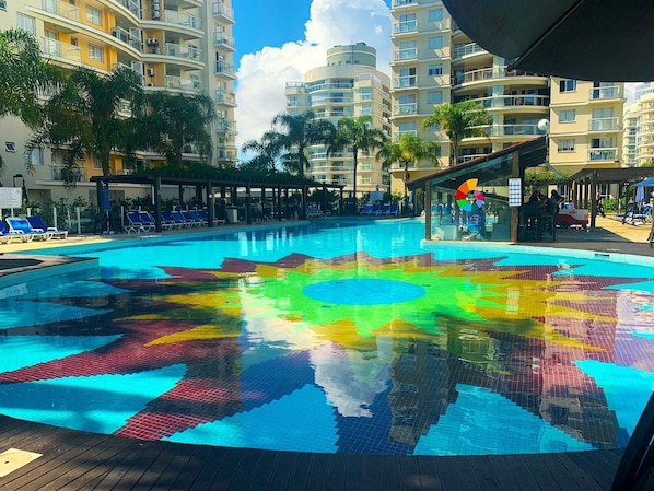 2 outdoor pools, pool umbrellas, pool loungers
