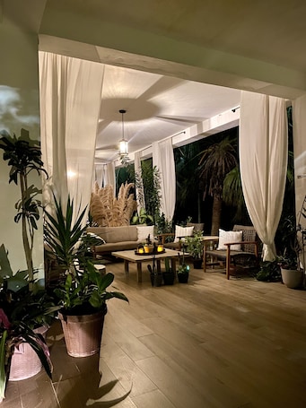 Terrace/patio. Designer Chic Suite w/ Green Patio & Free Bikes