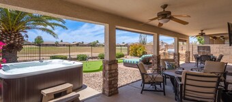 Spectacular sunsets and golf course views with private putting green!