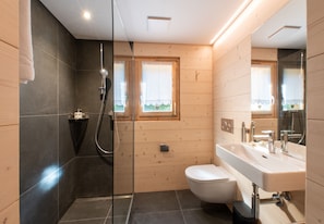 Bathtub, hair dryer, towels