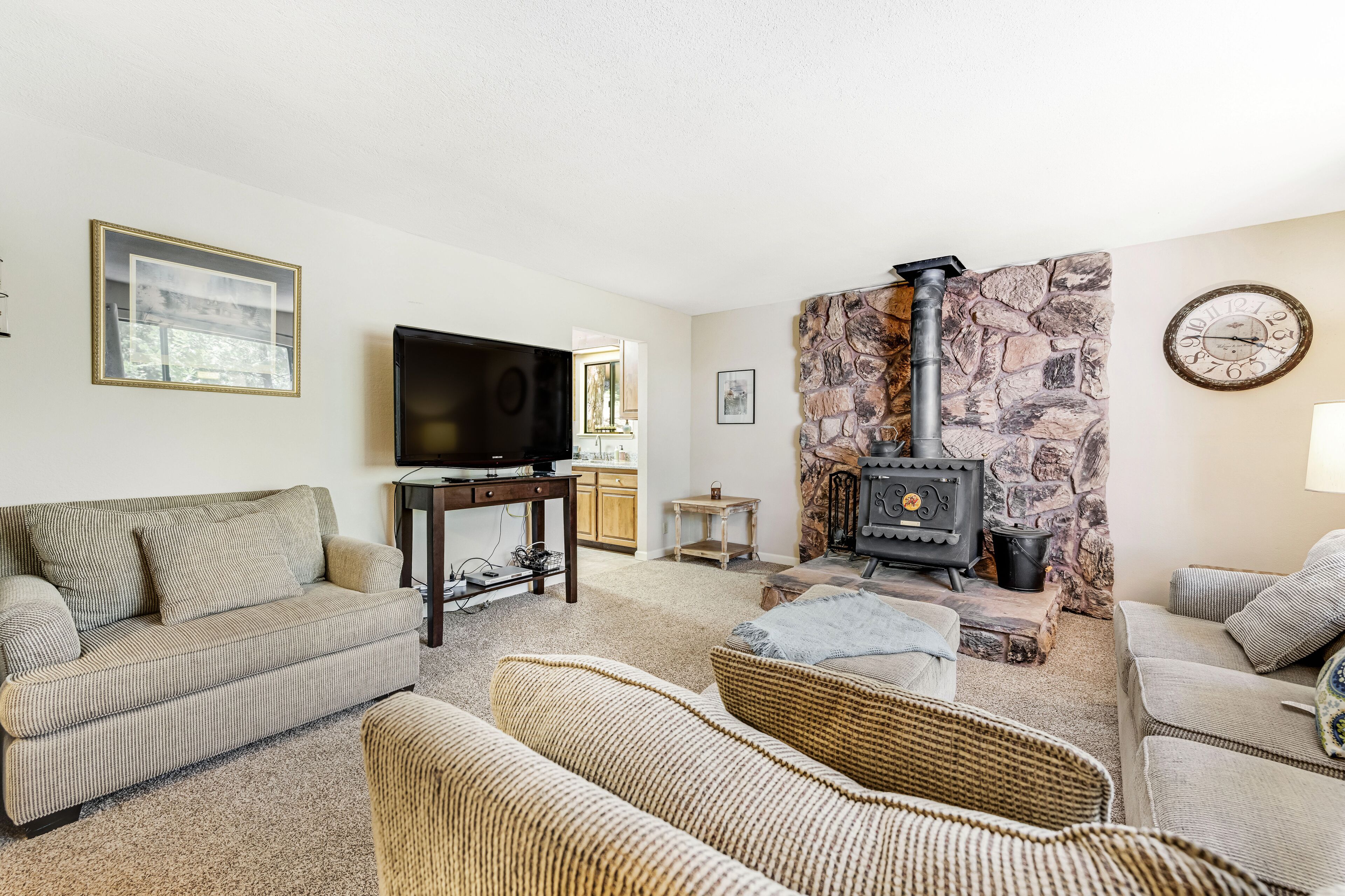 Cozy home with woodstove, deck, patio, grill, community pool, tennis, & gym