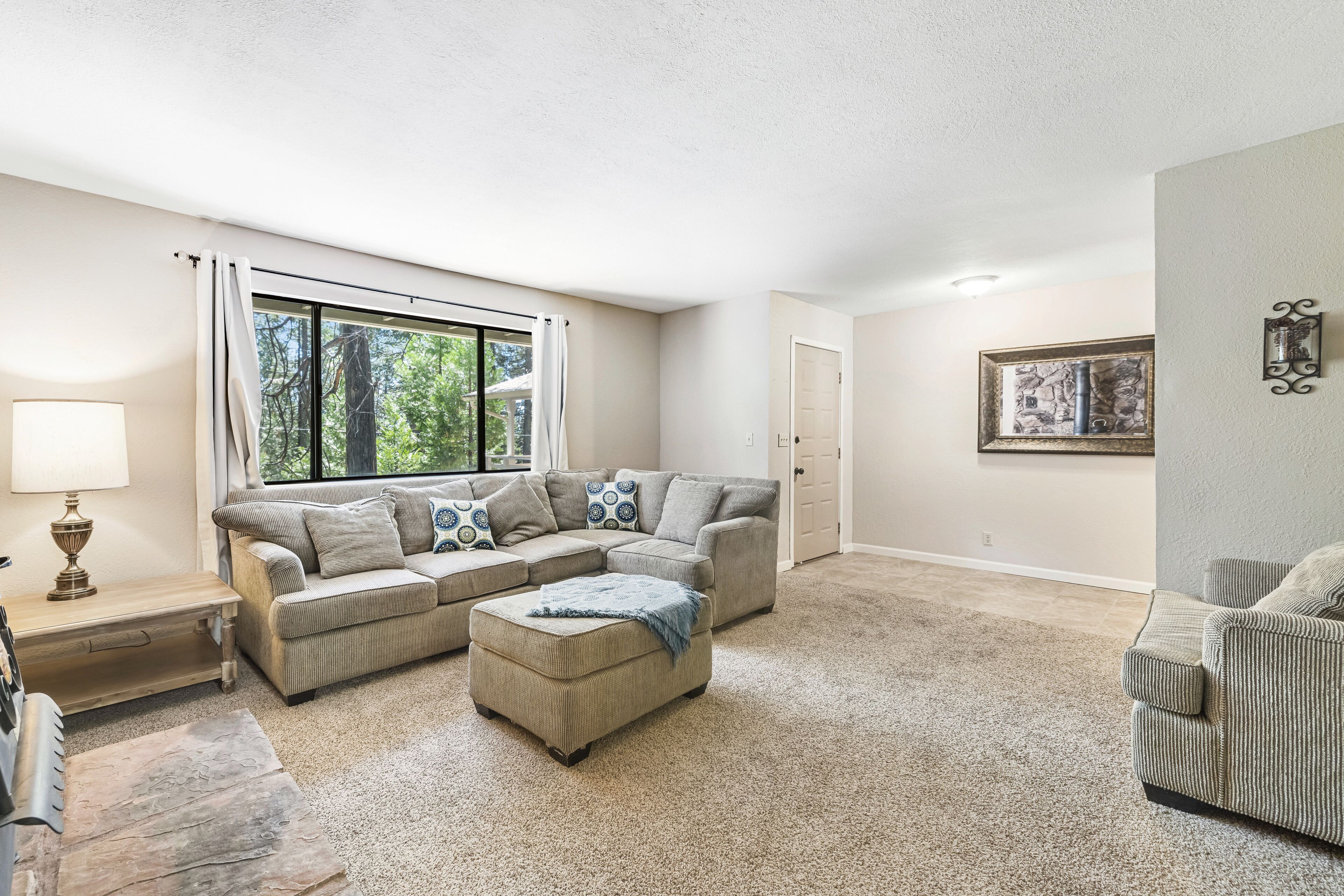 Cozy home with woodstove, deck, patio, grill, community pool, tennis, & gym