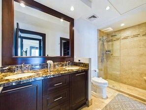 Shower, hair dryer, towels, shampoo