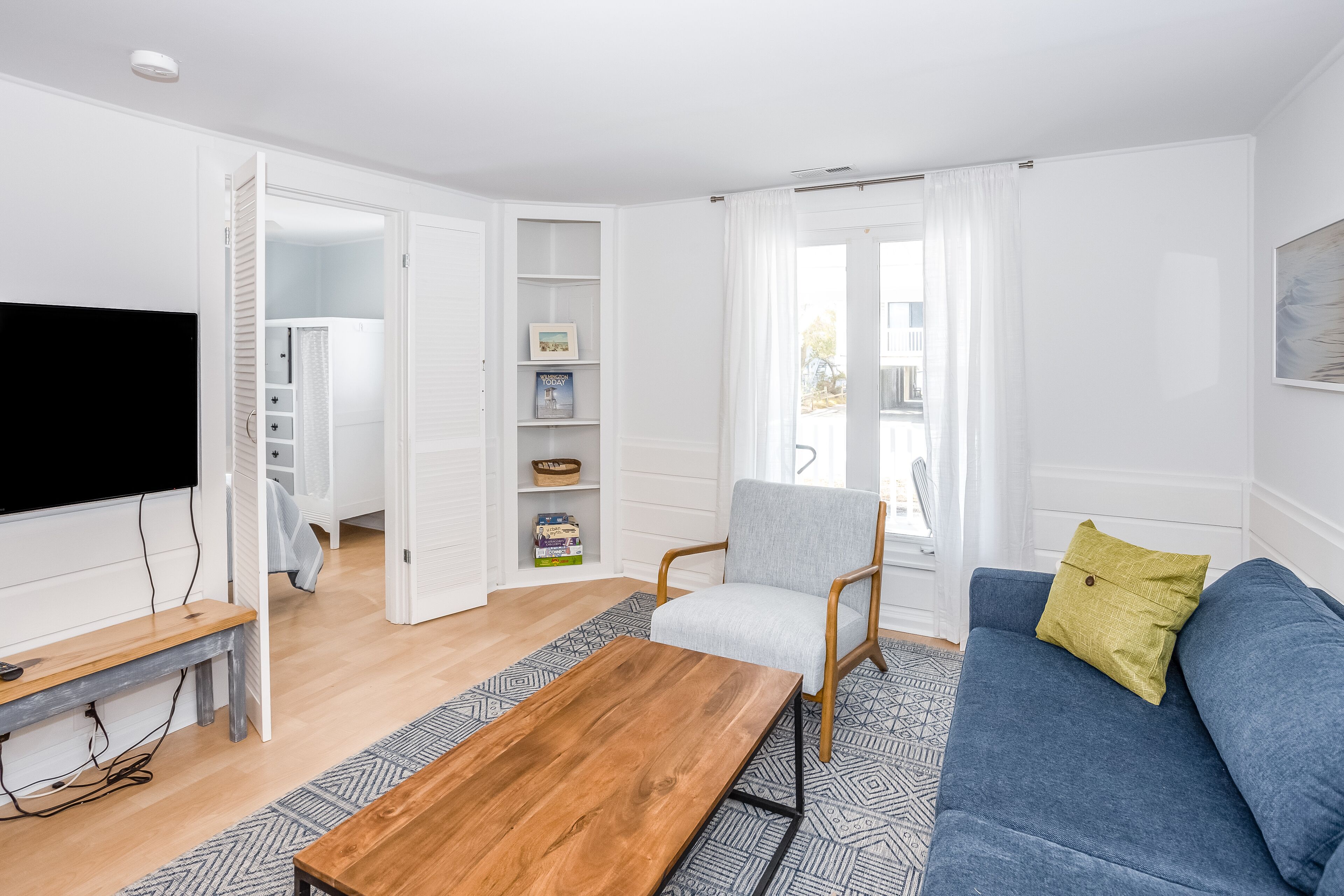 Colorful cottage steps from sand - dog-friendly, WiFi, W/D & central AC