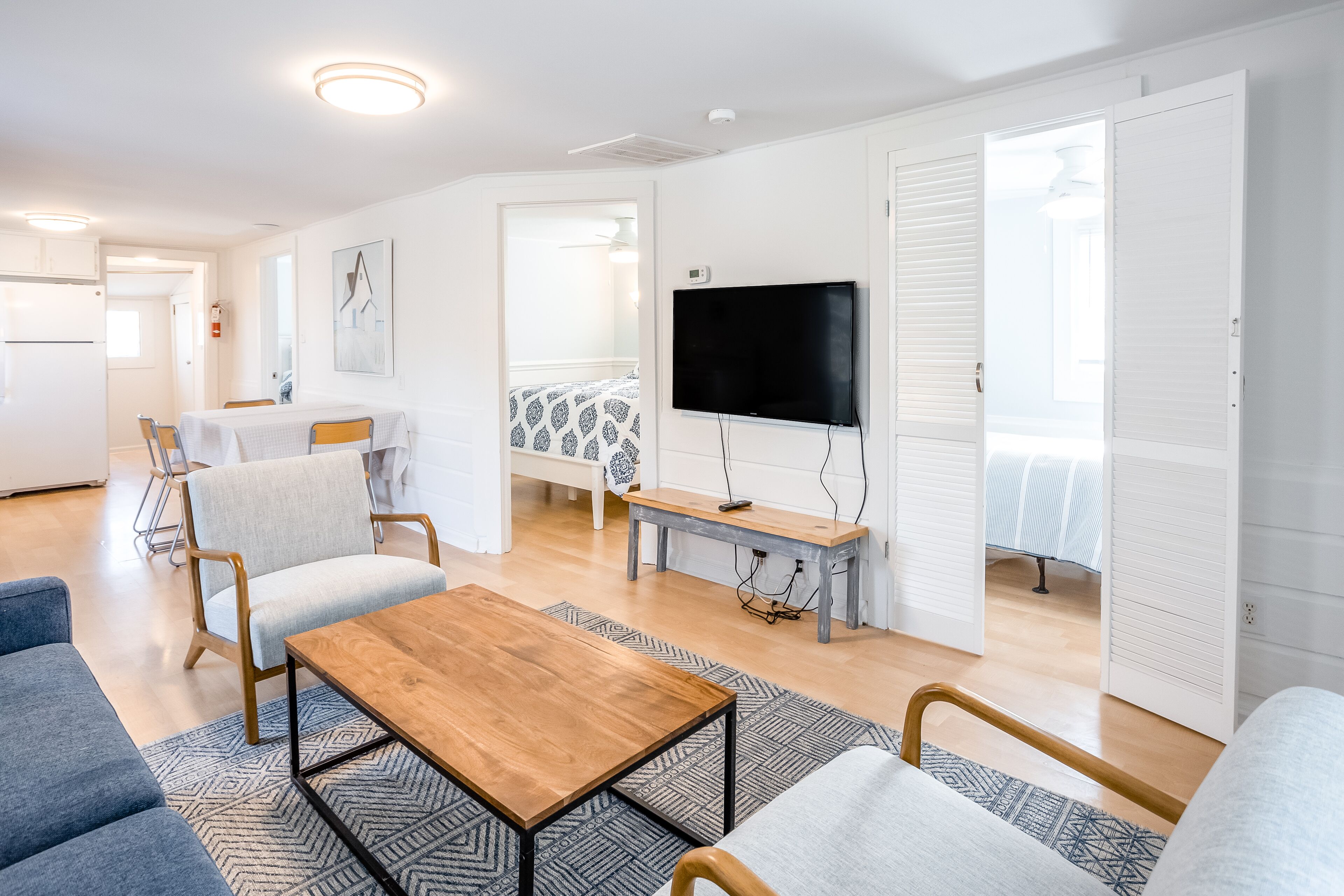 Colorful cottage steps from sand - dog-friendly, WiFi, W/D & central AC