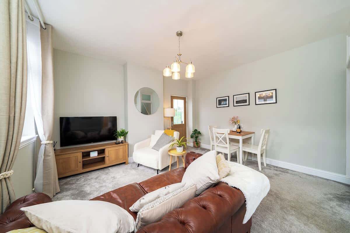 Living room with comfortable chesterfield sofa