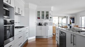 Dishwasher, coffee/tea maker, dining tables