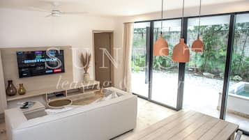 Comfort Apartment, 2 Bedrooms | Living area | 55-inch Smart TV with digital channels, TV, Netflix