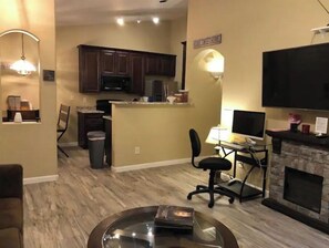 Smart TV, fireplace, Netflix, books