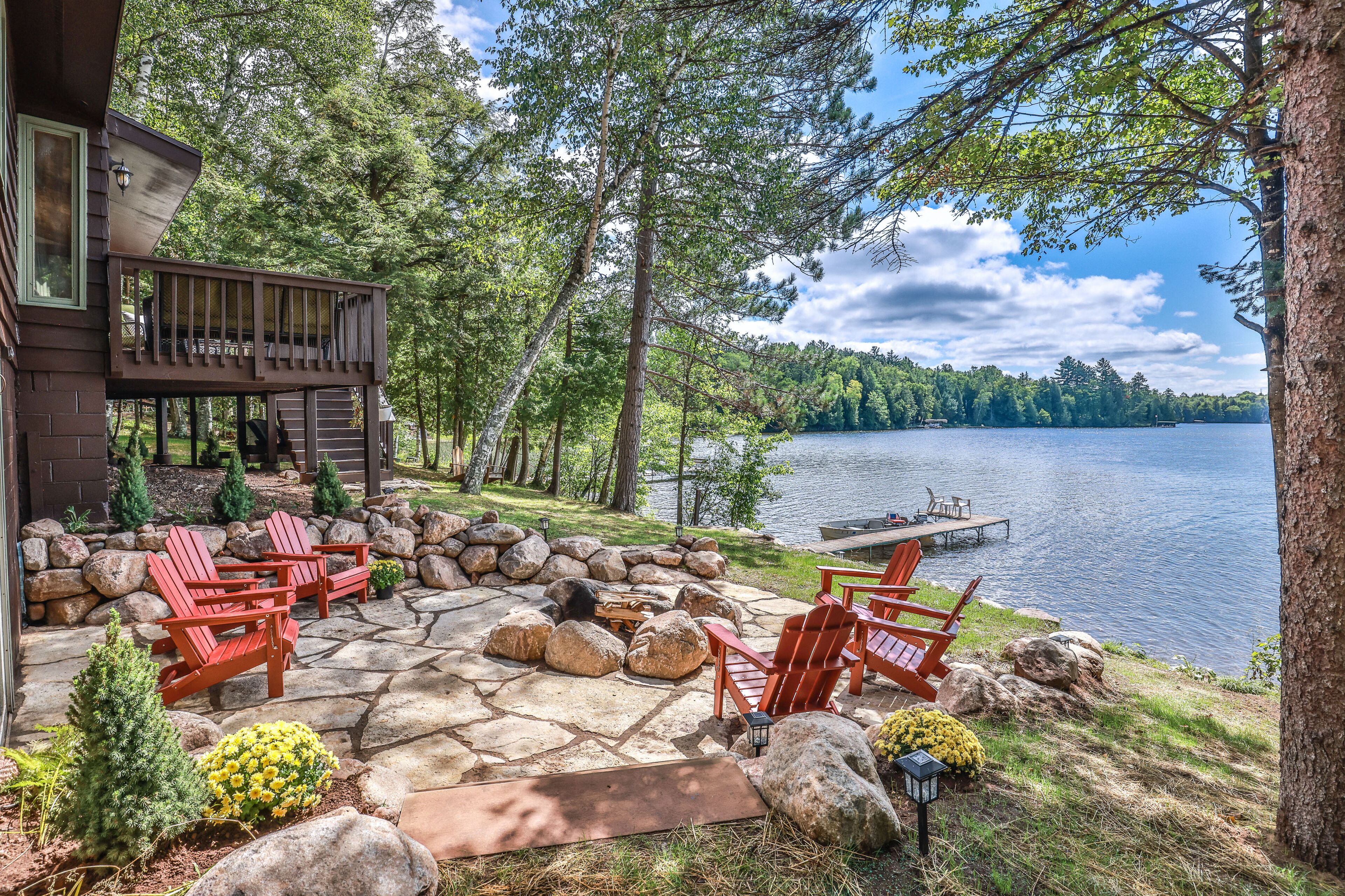 Lakefront home on snowmobile trail with kayaks/SUP, fireplace, game room & AC