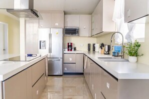 Fridge, microwave, stovetop, coffee/tea maker - Beach House at Emerald Homes (Rosarito)