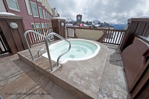 Shared building outdoor hot tub overlooking the clock tower