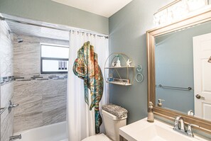 Shower, hair dryer, towels