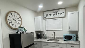 Fridge, microwave, coffee/tea maker, toaster
