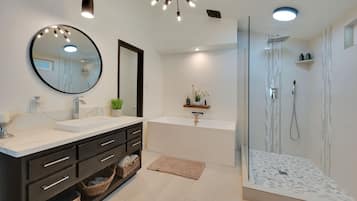 Combined shower/tub, hair dryer, towels, soap