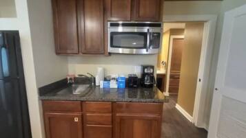 Standard Single Room | Private kitchenette | Mini-fridge, microwave, coffee/tea maker, toaster