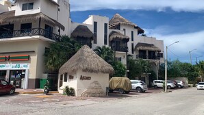 A hotel with multiple buildings, some with thatched roofs, and a small hut labeled 'Alix'. - Casa De Namaste- Relaxing 1 Br Condo near Playa's best Beaches & 5th Ave! (Playa del Carmen)