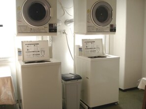 Convenient laundry facilities offer two front-loading washing machines with easy-to-use controls.