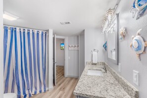 Shower, hair dryer, towels - Sandcastle Condominiums Unit 104 (Port Aransas)