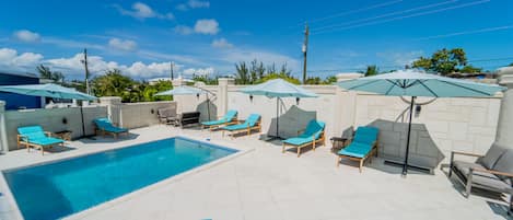 Outdoor pool, pool umbrellas, pool loungers