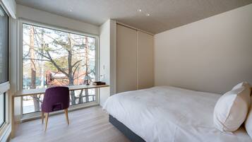 4 bedrooms, pillow-top beds, iron/ironing board, travel cot